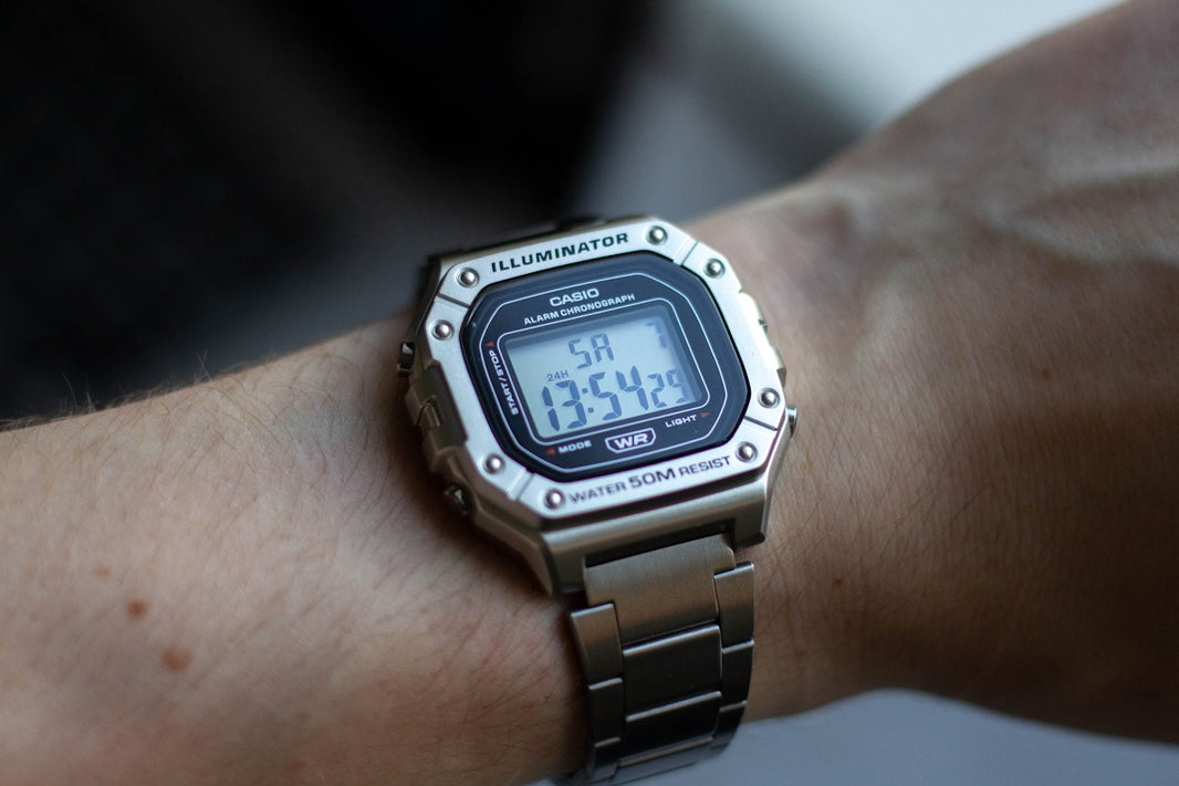A close up of a person's wrist with a watch on it