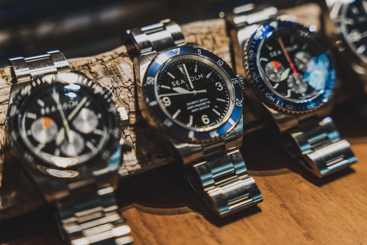 silver and black chronograph watch